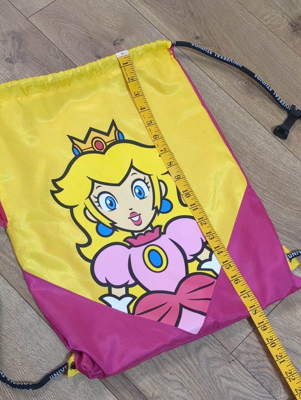 UNIVERSAL STUDIOS SUPER NINTENDO WORLD PRINCESS PEACH DRAWSTRING BACKPACK - Picture 9 of 9